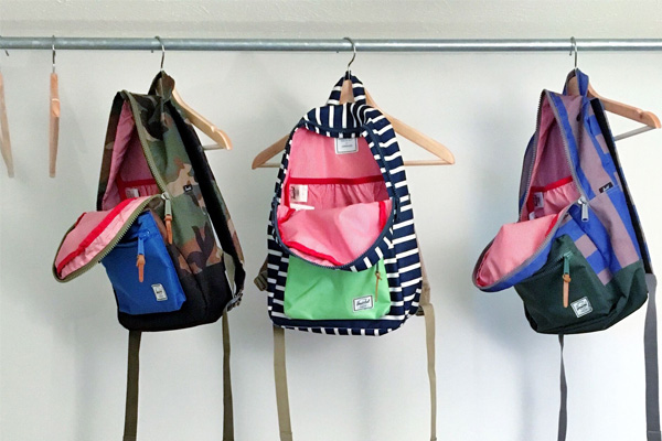 backpacks on hangers
