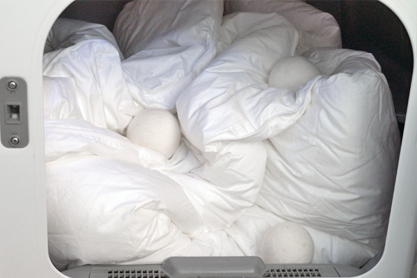 wool balls in dryer with duvet