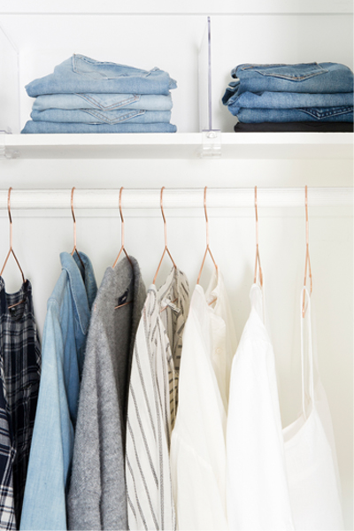 Clothing hanging in closet